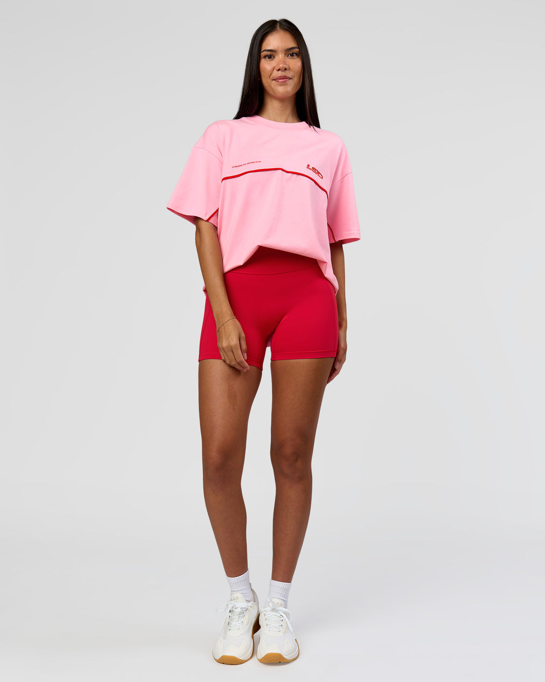 Woman wearing Inline Heavyweight FLXCotton Oversized Tee - Pink Rose-Flame | Model:Rhiley | Size:XS - view 12