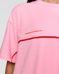 Woman wearing Inline Heavyweight FLXCotton Oversized Tee - Pink Rose-Flame | Model:Rhiley | Size:XS | Thumbnail Index: 21
