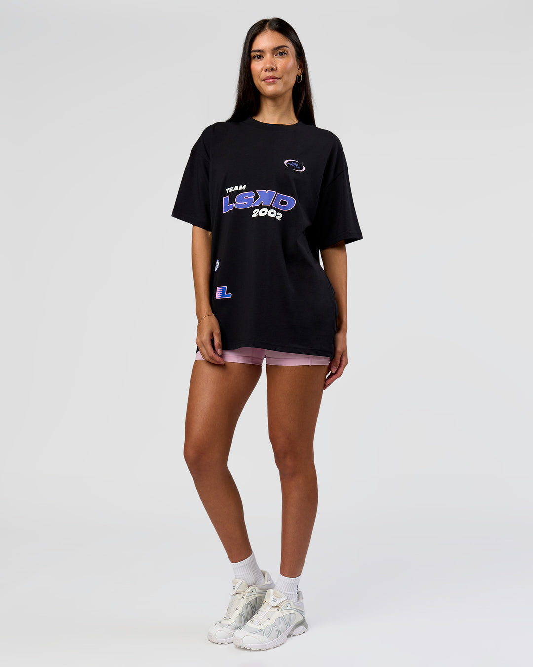 Woman wearing League Heavyweight FLXCotton Oversized Tee - Black-Power Cobalt | Model:Rhiley | Size:XS - view 13