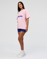 Woman wearing League Heavyweight FLXCotton Oversized Tee - Marshmallow-Power Cobalt | Model:Rhiley | Size:XS | Thumbnail Index: 12