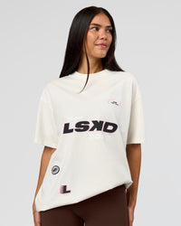 Woman wearing League Heavyweight FLXCotton Oversized Tee - Off White-Ground Coffee | Model:Rhiley | Size:XS | Thumbnail Index: 8