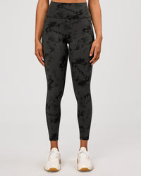 Woman wearing Fusion Ultra High-Rise 7/8 Legging Pockets - Obsidian/Black Tye Dye | Model:Rosie | Size:XS | Thumbnail Index: 1