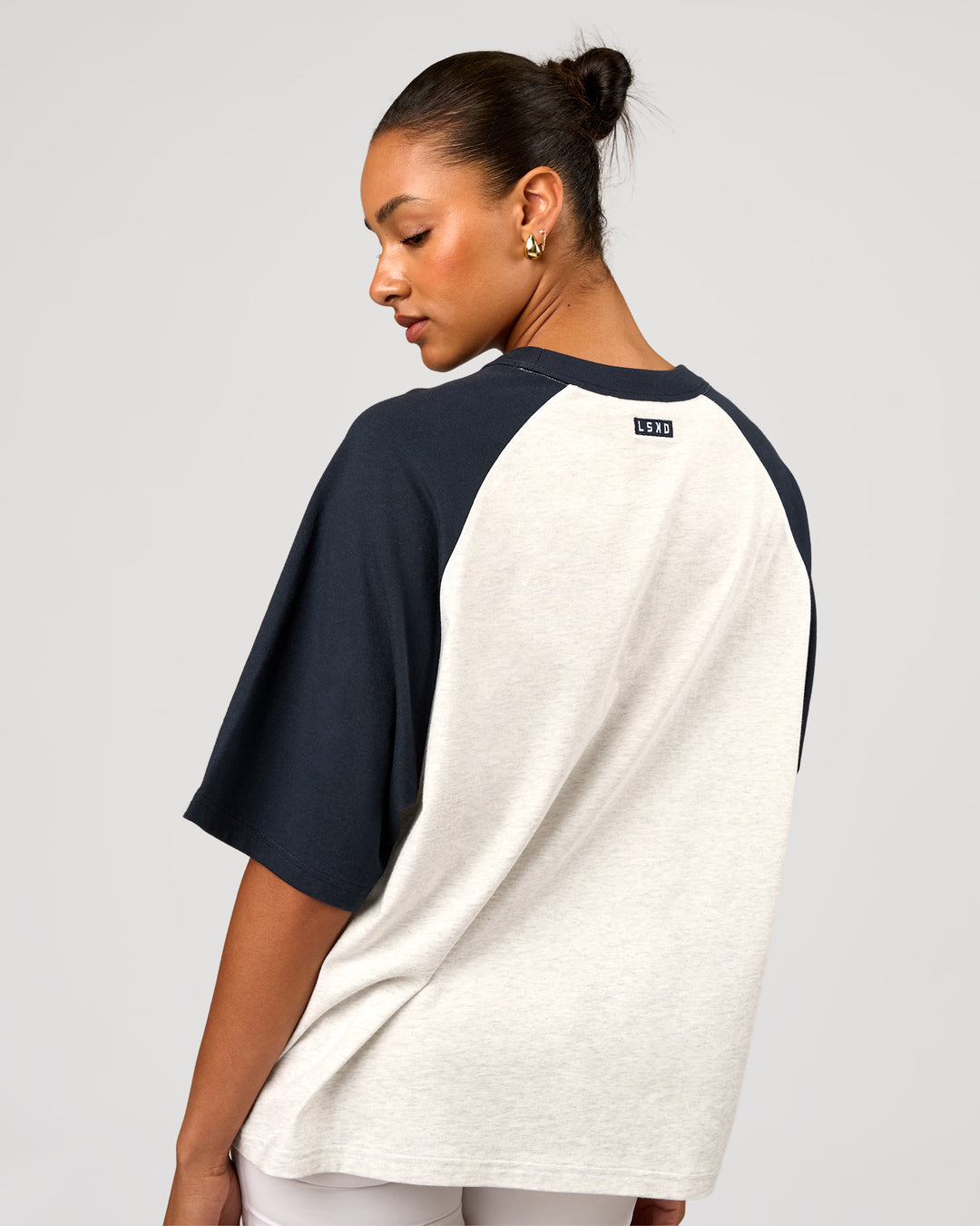 Woman wearing Victory Heavyweight Boxed Raglan Tee - Silver Marl-Midnight Navy | Model:Rosie | Size:XS - view 5