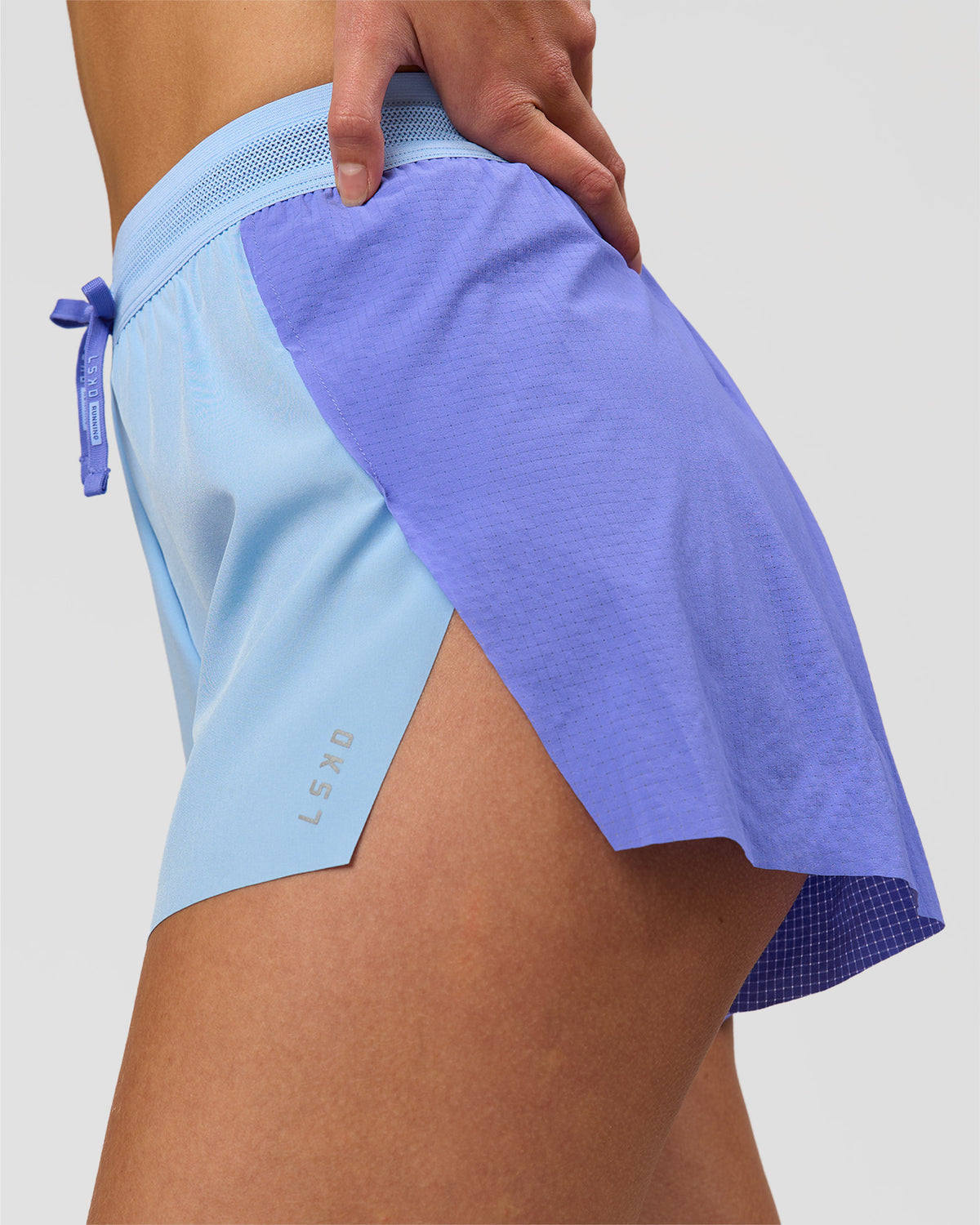 Woman wearing Accelerate 3" High-Rise Running Short - Bluebell-Open Air | Model:Taneisha | Size:XS