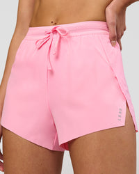 Woman wearing Accelerate 3" High-Rise Running Short - Pink Rose | Model:Taneisha | Size:XS | Thumbnail Index: 0