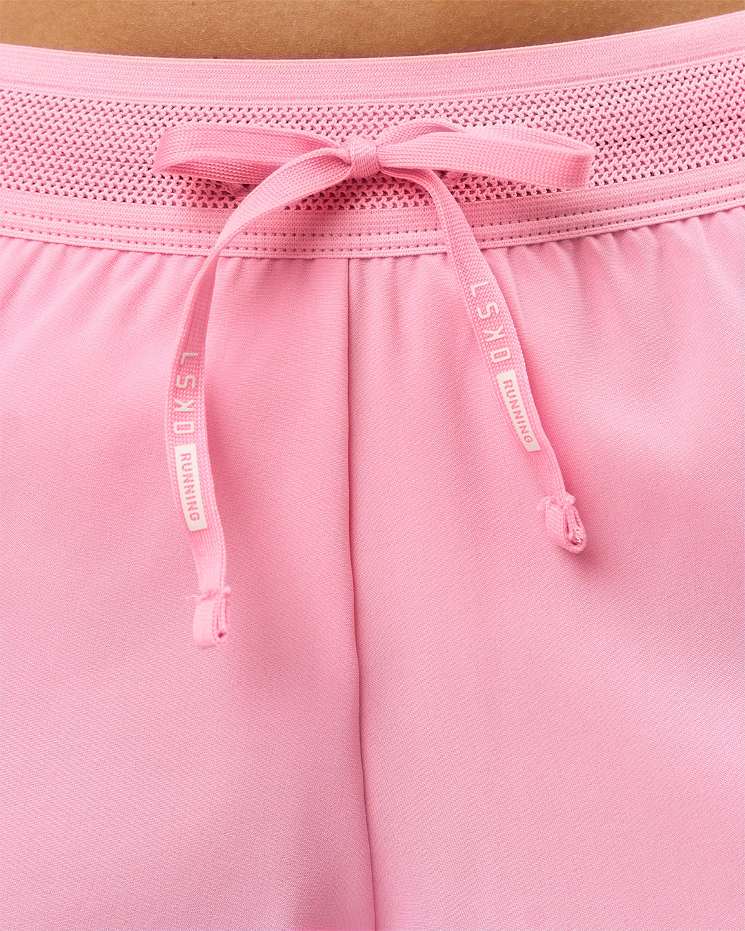 Woman wearing Accelerate 3" Mid-Rise Running Short - Pink Rose | Model:Taneisha | Size:XS - view 5