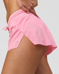 Woman wearing Accelerate 3" Mid-Rise Running Short - Pink Rose | Model:Taneisha | Size:XS | Thumbnail Index: 2