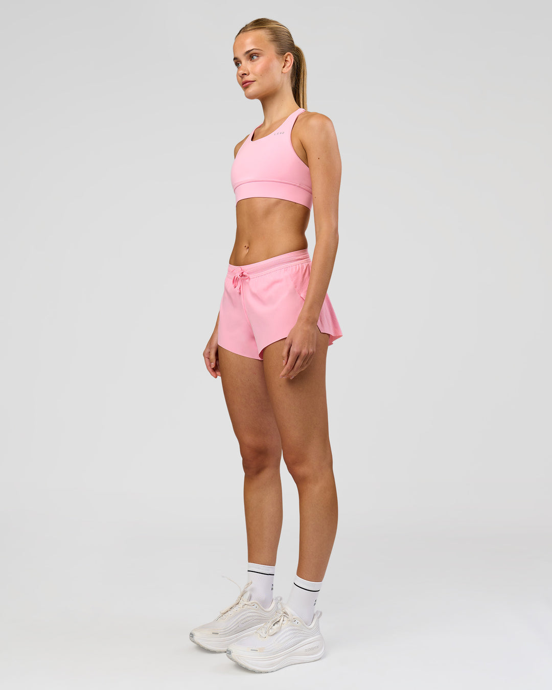 Woman wearing Accelerate 3" Mid-Rise Running Short - Pink Rose | Model:Taneisha | Size:XS - view 9