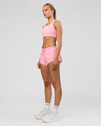 Woman wearing Accelerate 3" Mid-Rise Running Short - Pink Rose | Model:Taneisha | Size:XS | Thumbnail Index: 8