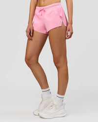 Woman wearing Accelerate 3" Mid-Rise Running Short - Pink Rose | Model:Taneisha | Size:XS | Thumbnail Index: 10