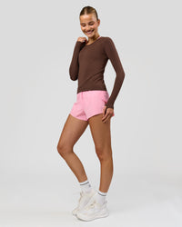 Woman wearing AeroFLX+ Seamless Long Sleeve Tee - Hot Chocolate/Hot Chocolate | Model:Taneisha | Size:XS | Thumbnail Index: 6
