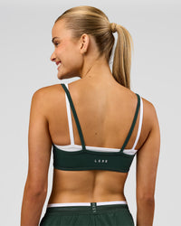 Woman wearing Balance Sports Bra - Midnight Green-White | Model:Taneisha | Size:XS | Thumbnail Index: 1