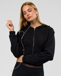 Woman wearing Bend Contour Silhouette Zip Through Hoodie - Black | Model:Taneisha | Size:XS | Thumbnail Index: 4