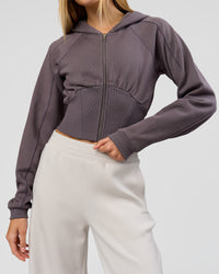 Woman wearing Bend Contour Silhouette Zip Through Hoodie - Duskstone | Model:Taneisha | Size:XS | Thumbnail Index: 1