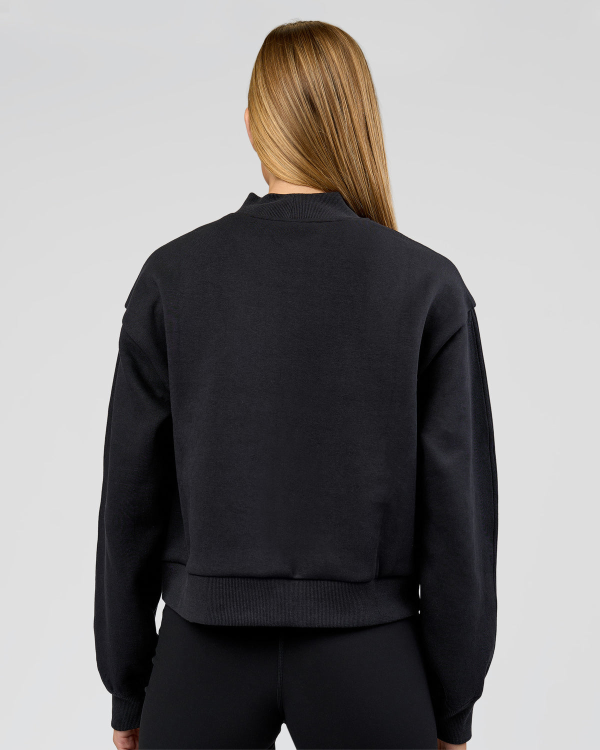 Woman wearing Bomber ZeroCrease Spacer Jacket - Black | Model:Taneisha | Size:XS