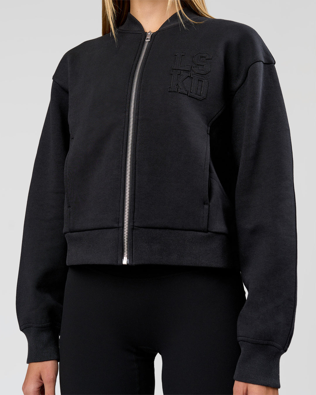 Woman wearing Bomber ZeroCrease Spacer Jacket - Black | Model:Taneisha | Size:XS - view 4