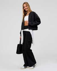 Woman wearing Bomber ZeroCrease Spacer Jacket - Black | Model:Taneisha | Size:XS | Thumbnail Index: 6