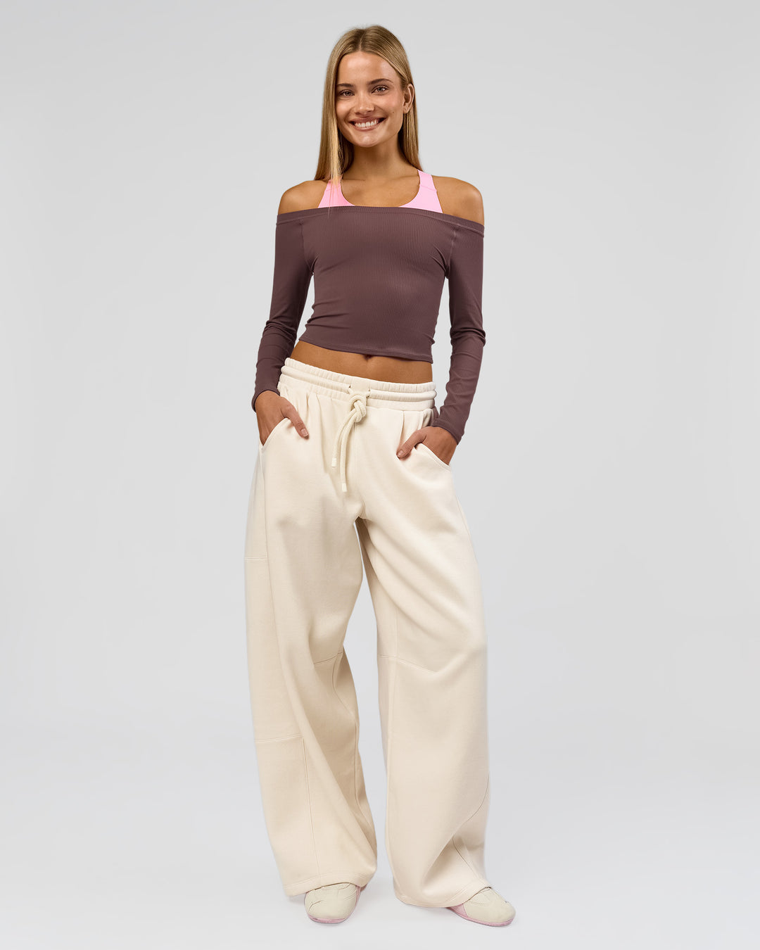 Woman wearing Bree Barrel Fleece Track Pant - Vanilla Bean | Model:Taneisha | Size:XS - view 1