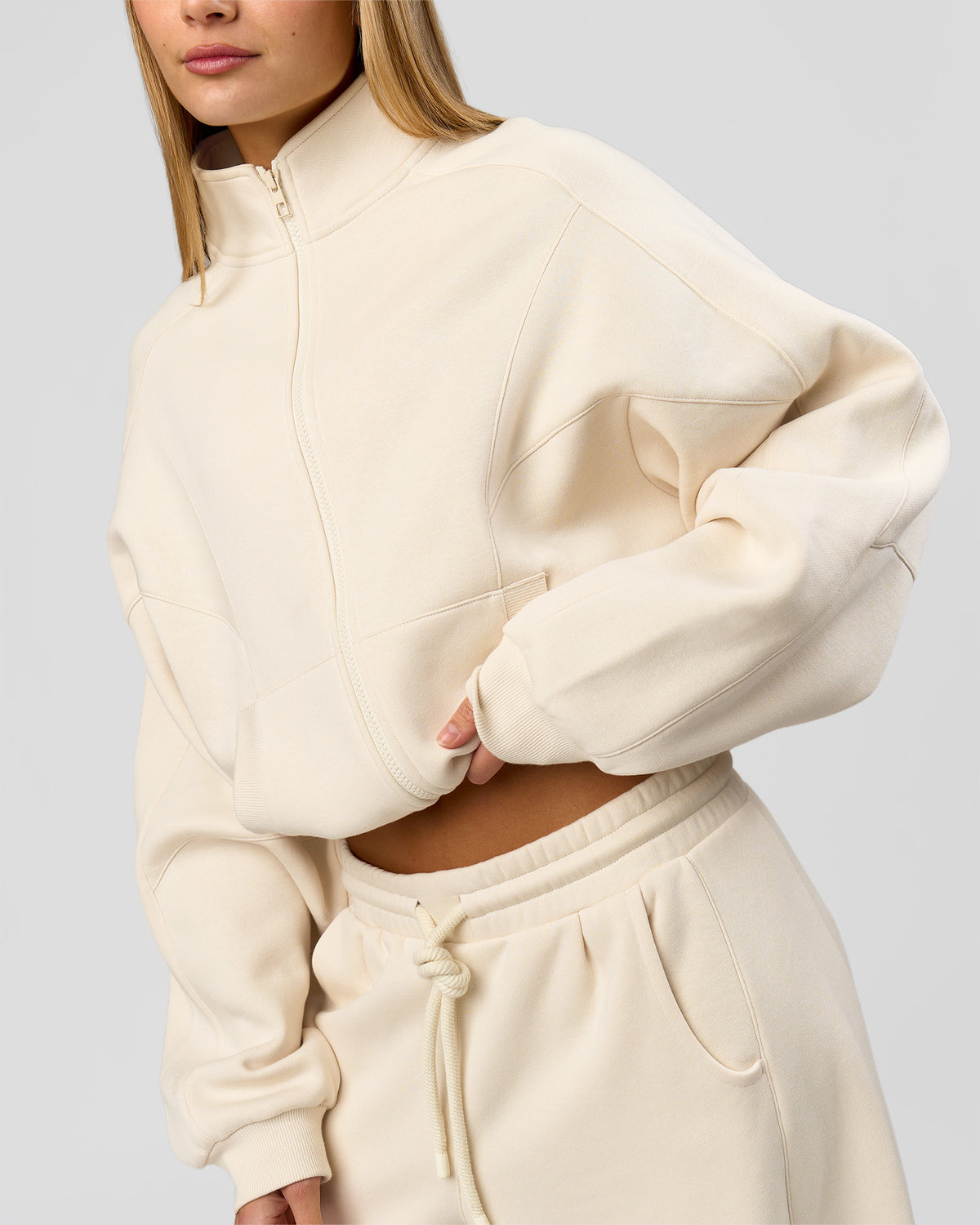 Woman wearing Bree Oversized Fleece Zip Thru - Vanilla Bean | Model:Taneisha | Size:XS