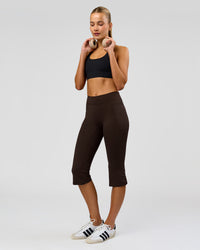 Woman wearing Deep V-Contour High-Rise Flared Capri - Ground Coffee | Model:Taneisha | Size:XS | Thumbnail Index: 0