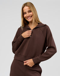 Woman wearing Elevate SoftTouch 1/2 Zip Sweater - Hot Chocolate | Model:Taneisha | Size:XS | Thumbnail Index: 0