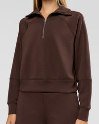 Woman wearing Elevate SoftTouch 1/2 Zip Sweater - Hot Chocolate | Model:Taneisha | Size:XS | Thumbnail Index: 1