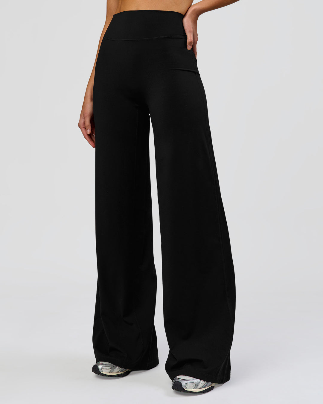 Woman wearing Elixir High-Rise Tall Pant - Black | Model:Taneisha | Size:XS - view 4