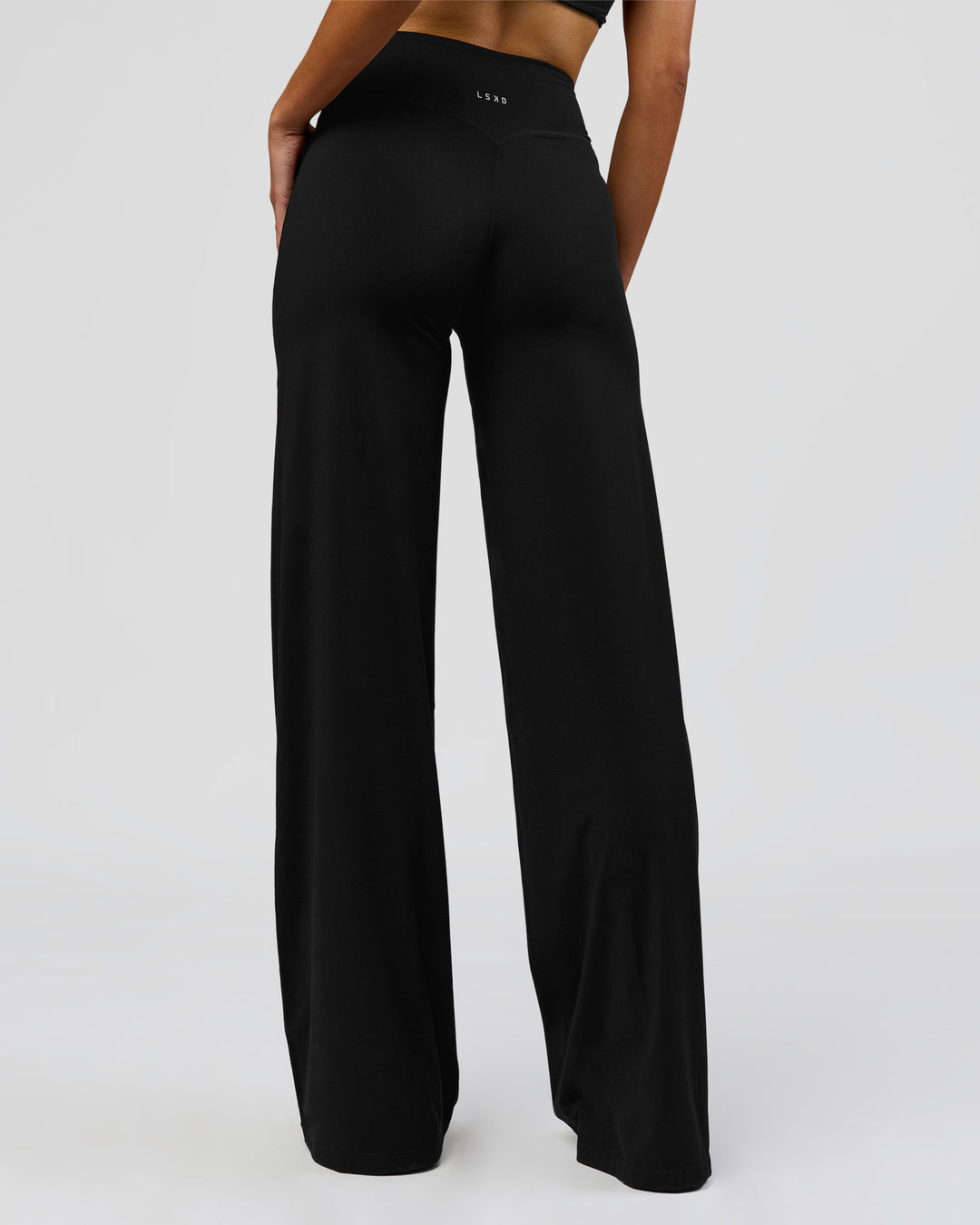 Woman wearing Elixir High-Rise Tall Pant - Black | Model:Taneisha | Size:XS - view 5