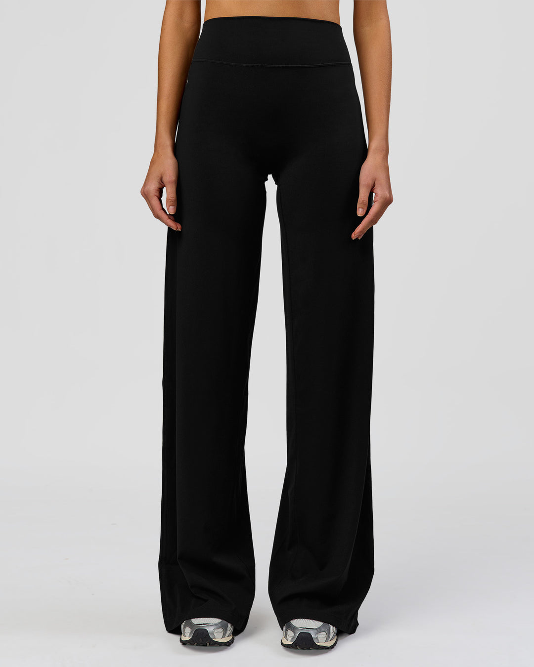 Woman wearing Elixir High-Rise Tall Pant - Black | Model:Taneisha | Size:XS - view 6