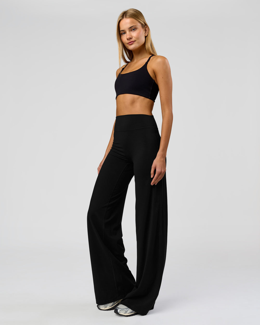 Woman wearing Elixir High-Rise Tall Pant - Black | Model:Taneisha | Size:XS - view 9