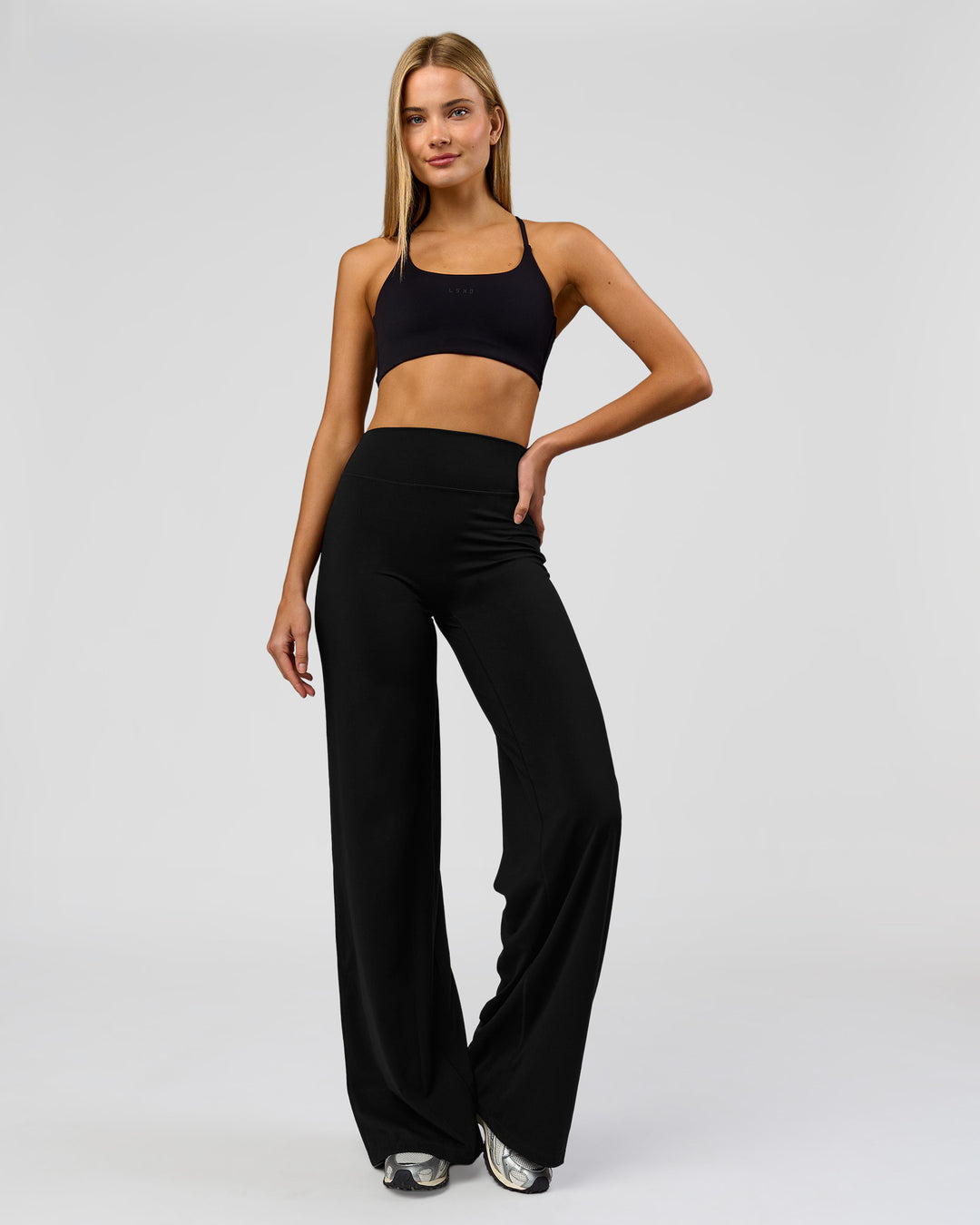 Woman wearing Elixir High-Rise Tall Pant - Black | Model:Taneisha | Size:XS - view 10