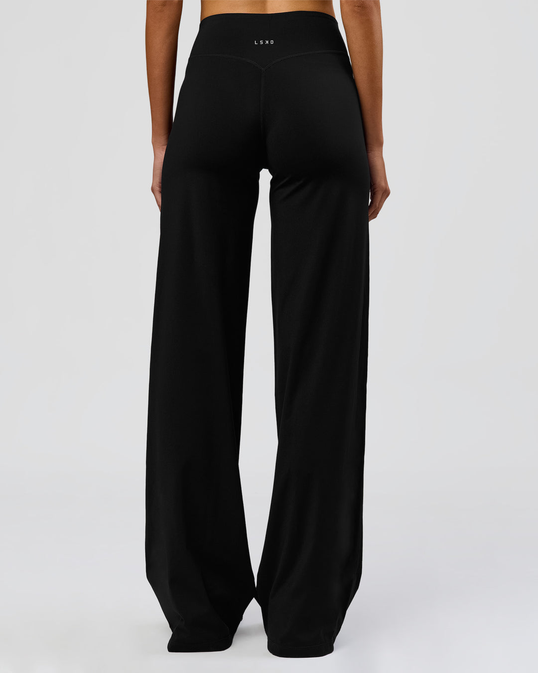 Woman wearing Elixir High-Rise Tall Pant - Black | Model:Taneisha | Size:XS - view 14