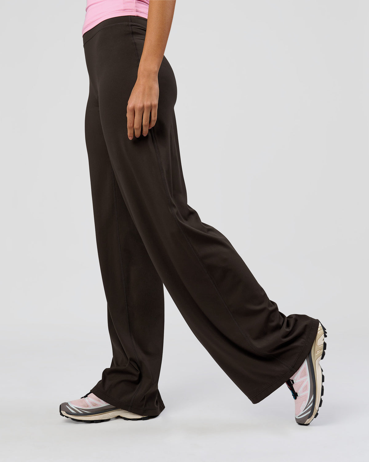 Woman wearing Elixir High-Rise Tall Pant - Ground Coffee | Model:Taneisha | Size:XS