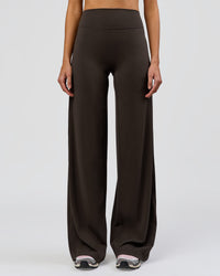 Woman wearing Elixir High-Rise Tall Pant - Ground Coffee | Model:Taneisha | Size:XS | Thumbnail Index: 4