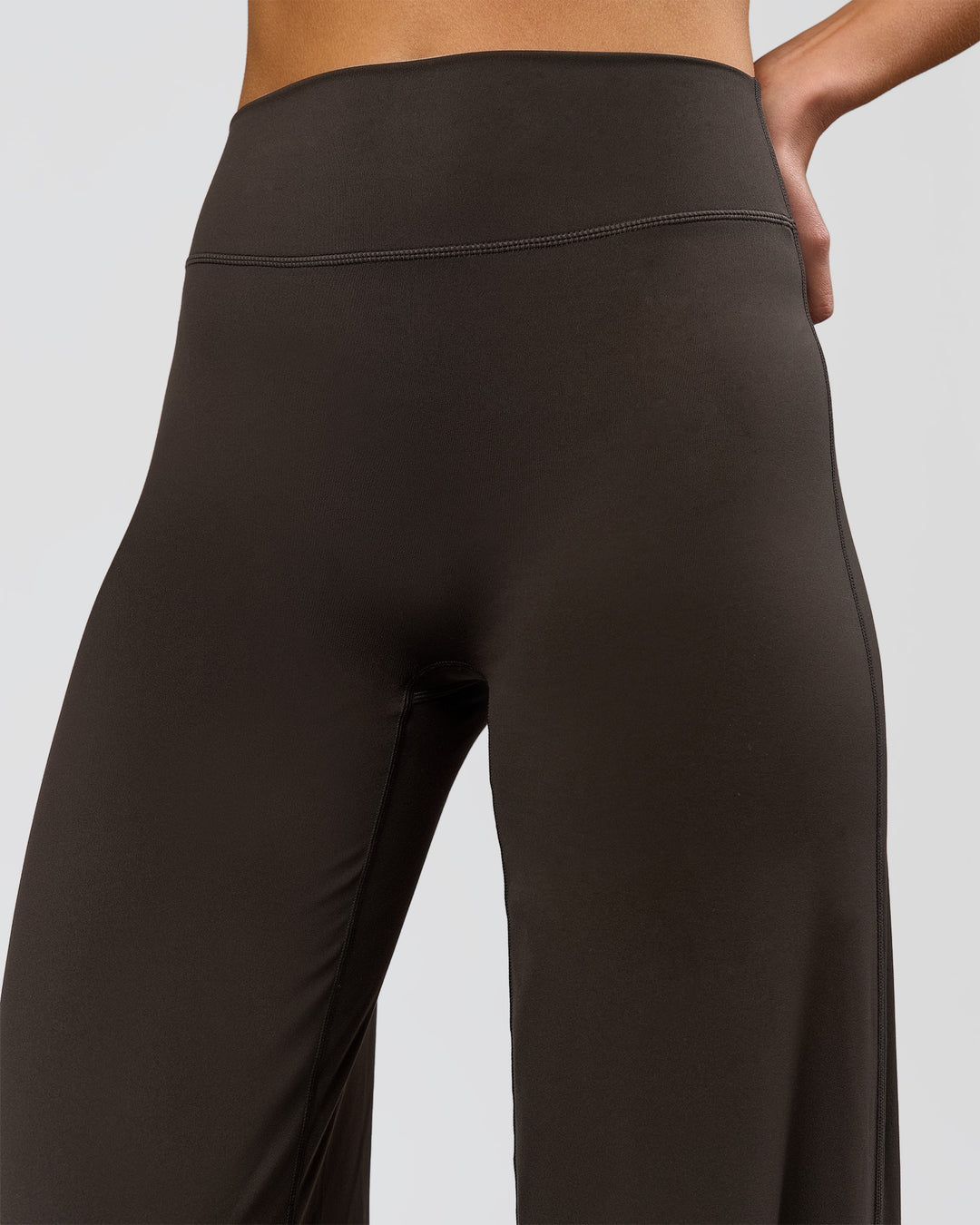 Woman wearing Elixir High-Rise Tall Pant - Ground Coffee | Model:Taneisha | Size:XS - view 7