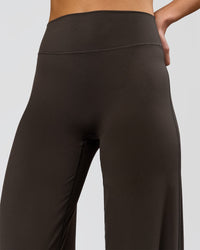 Woman wearing Elixir High-Rise Tall Pant - Ground Coffee | Model:Taneisha | Size:XS | Thumbnail Index: 6