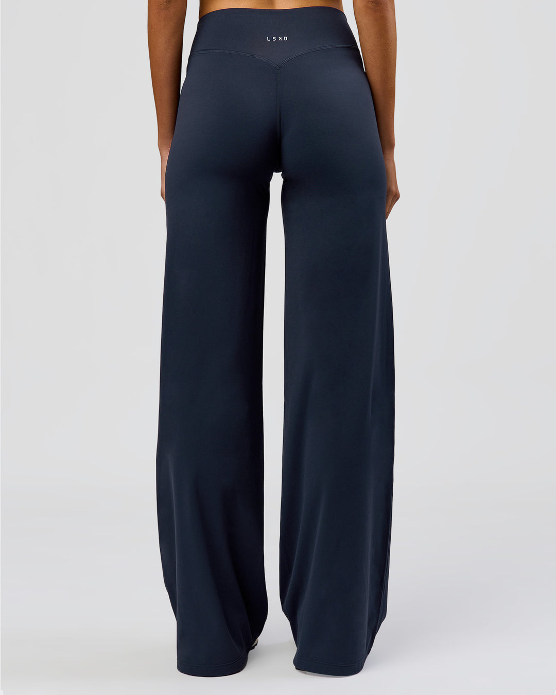 Woman wearing Elixir High-Rise Tall Pant - Midnight Navy | Model:Taneisha | Size:XS - view 4