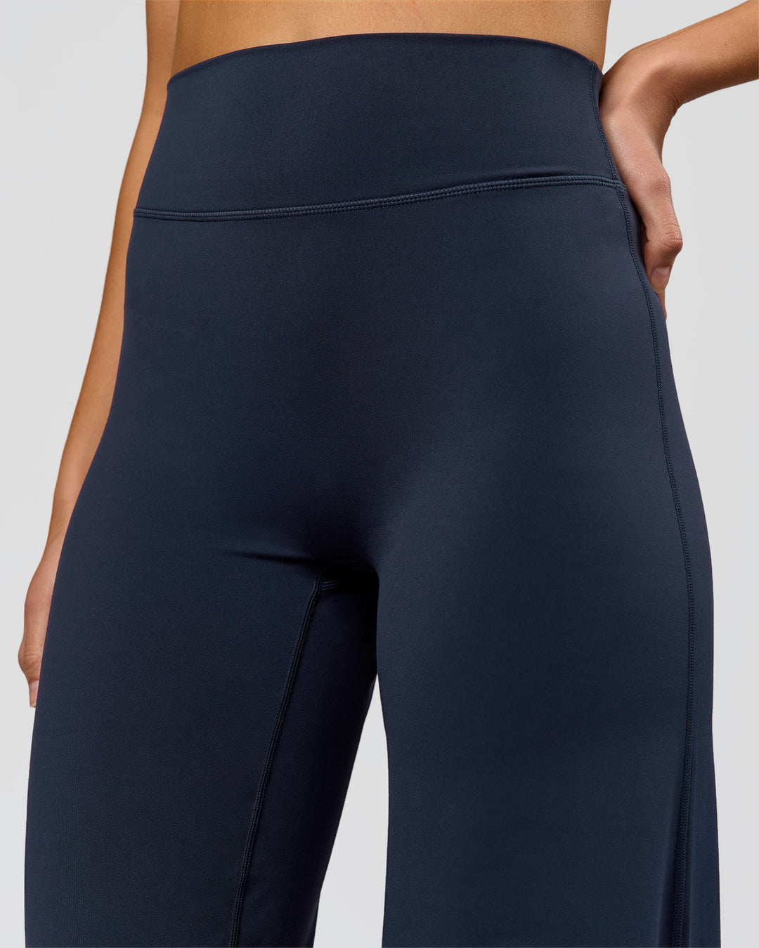 Woman wearing Elixir High-Rise Tall Pant - Midnight Navy | Model:Taneisha | Size:XS - view 7