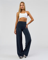 Woman wearing Elixir High-Rise Tall Pant - Midnight Navy | Model:Taneisha | Size:XS | Thumbnail Index: 10