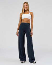 Woman wearing Elixir High-Rise Tall Pant - Midnight Navy | Model:Taneisha | Size:XS | Thumbnail Index: 8