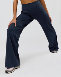 Woman wearing Elixir High-Rise Tall Pant - Midnight Navy | Model:Taneisha | Size:XS | Thumbnail Index: 9