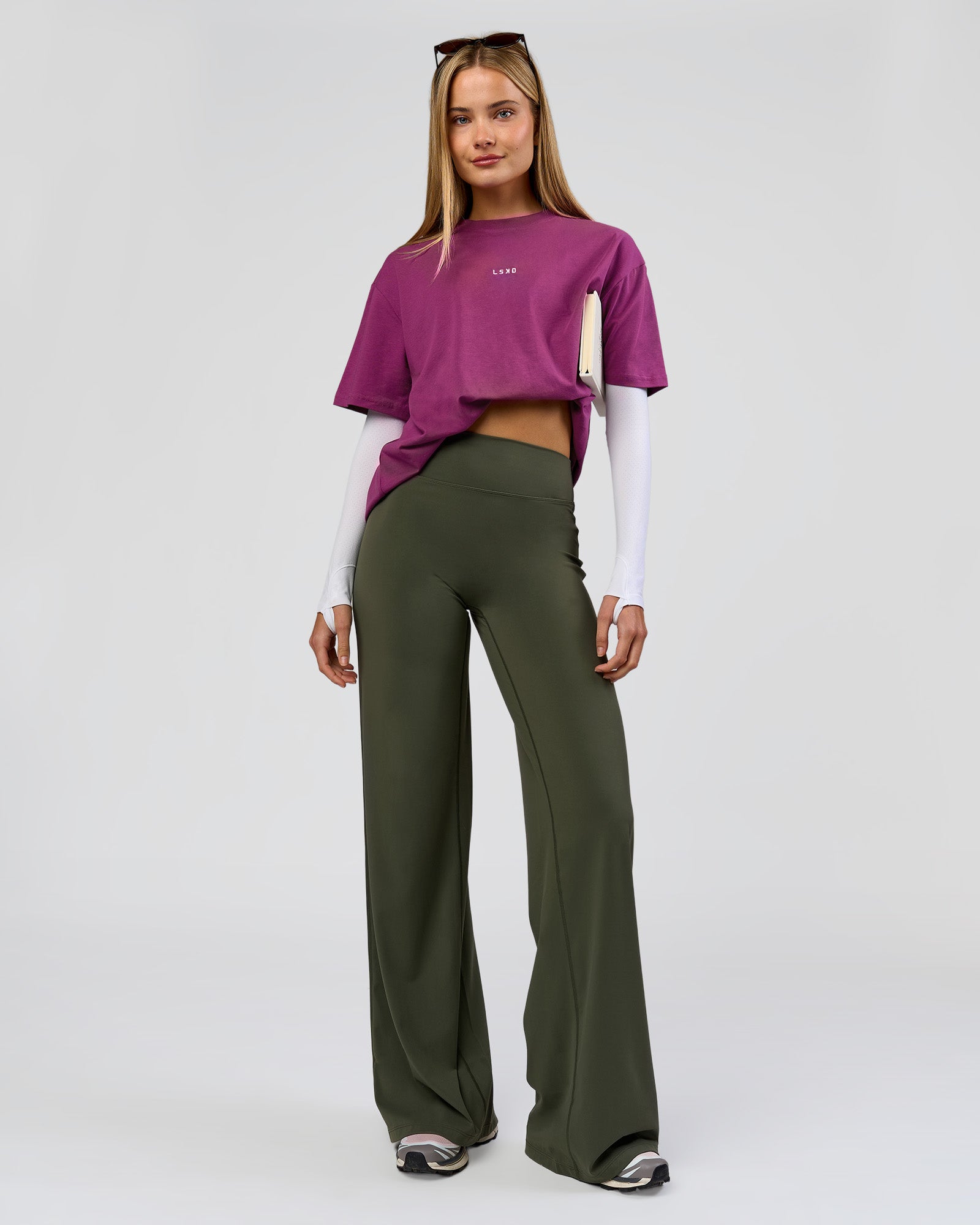 Woman wearing Elixir High-Rise Tall Pant - Pure Olive | Model:Taneisha | Size:XS