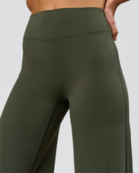 Woman wearing Elixir High-Rise Tall Pant - Pure Olive | Model:Taneisha | Size:XS | Thumbnail Index: 8