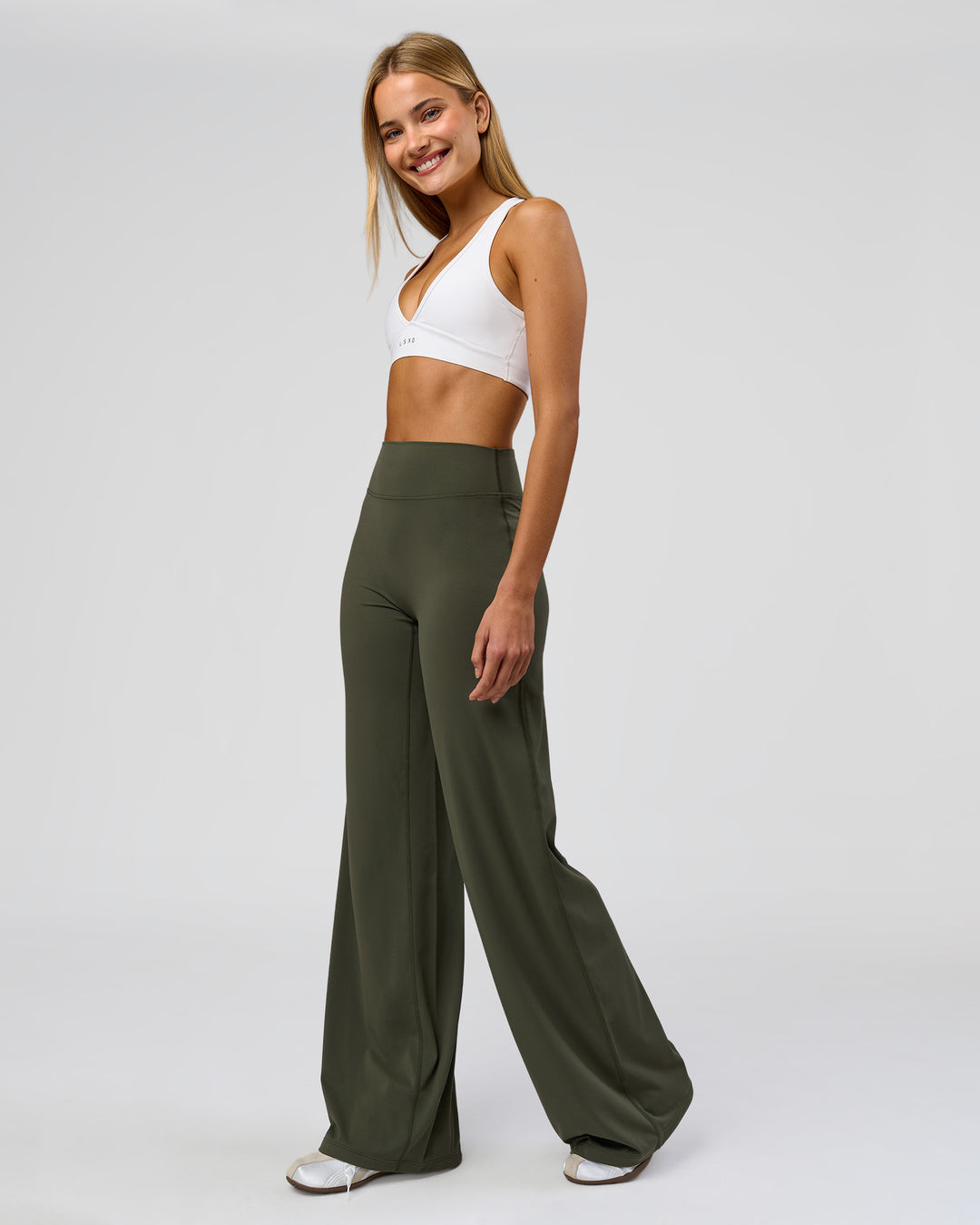 Woman wearing Elixir High-Rise Tall Pant - Pure Olive | Model:Taneisha | Size:XS - view 12