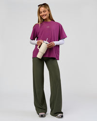 Woman wearing Elixir High-Rise Tall Pant - Pure Olive | Model:Taneisha | Size:XS | Thumbnail Index: 12