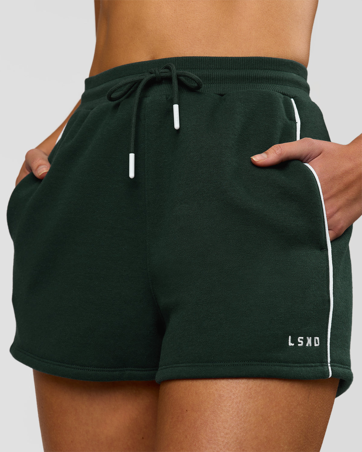 Woman wearing Fast Track Lounge Short - Midnight Green-White | Model:Taneisha | Size:XS - view 1