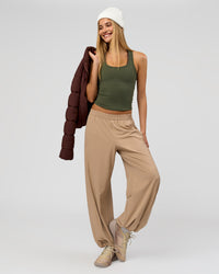 Woman wearing Flow Rib Scoop Neck Tank - Pure Olive | Model:Taneisha | Size:XS | Thumbnail Index: 5