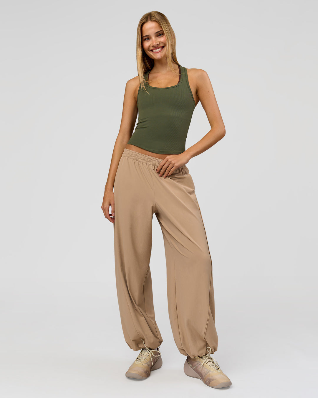 Woman wearing Flow Rib Scoop Neck Tank - Pure Olive | Model:Taneisha | Size:XS - view 10