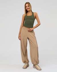 Woman wearing Flow Rib Scoop Neck Tank - Pure Olive | Model:Taneisha | Size:XS | Thumbnail Index: 9