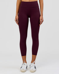 Woman wearing Fusion High-Rise 7/8 Legging Pockets - Cherry Lacquer | Model:Taneisha | Size:XS | Thumbnail Index: 2